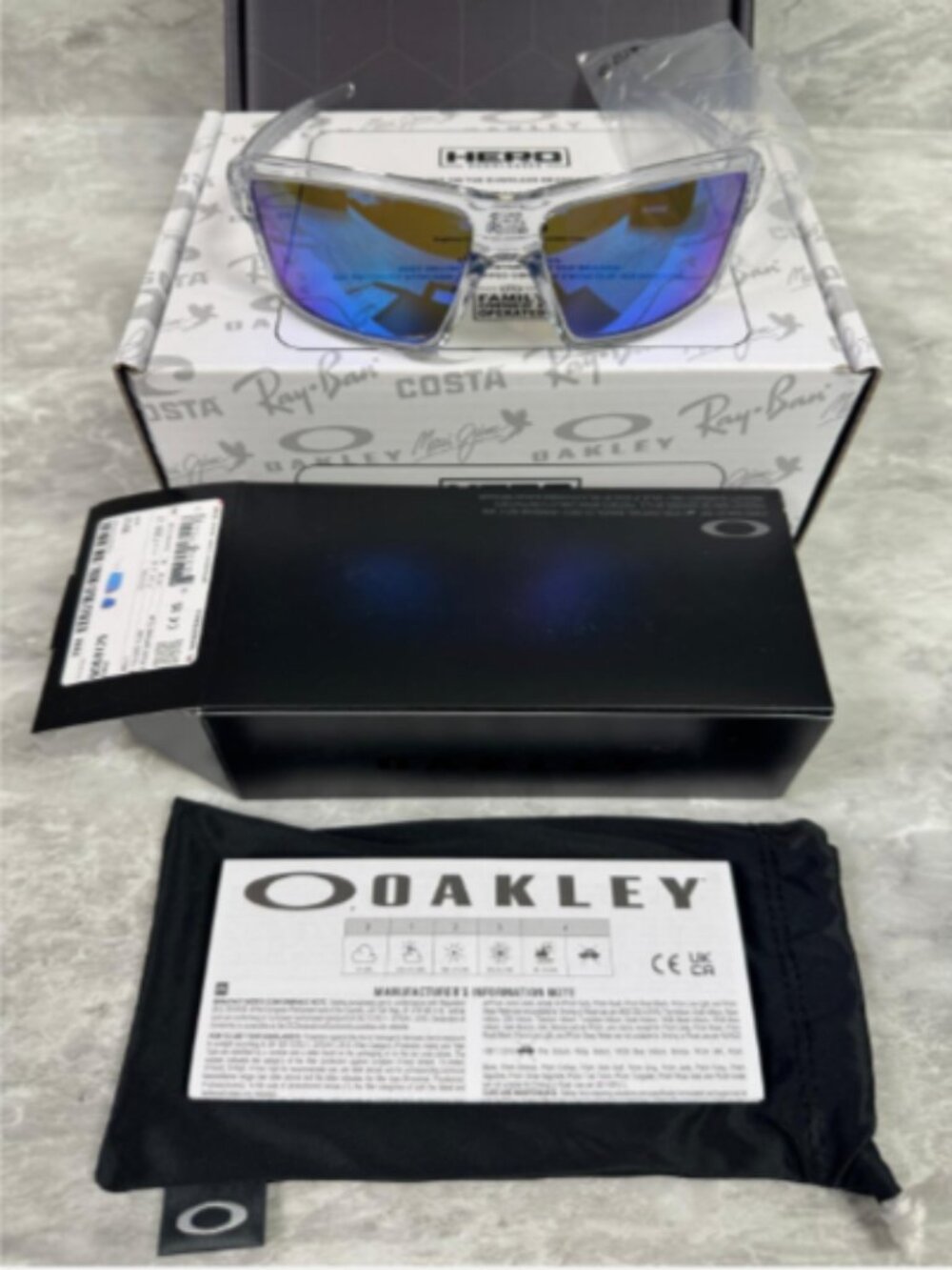OAKLEY | NEW | CABLES | 9129 - 05 | 63 | POLISHED CLEAR | PRIZM SAPPHIRE